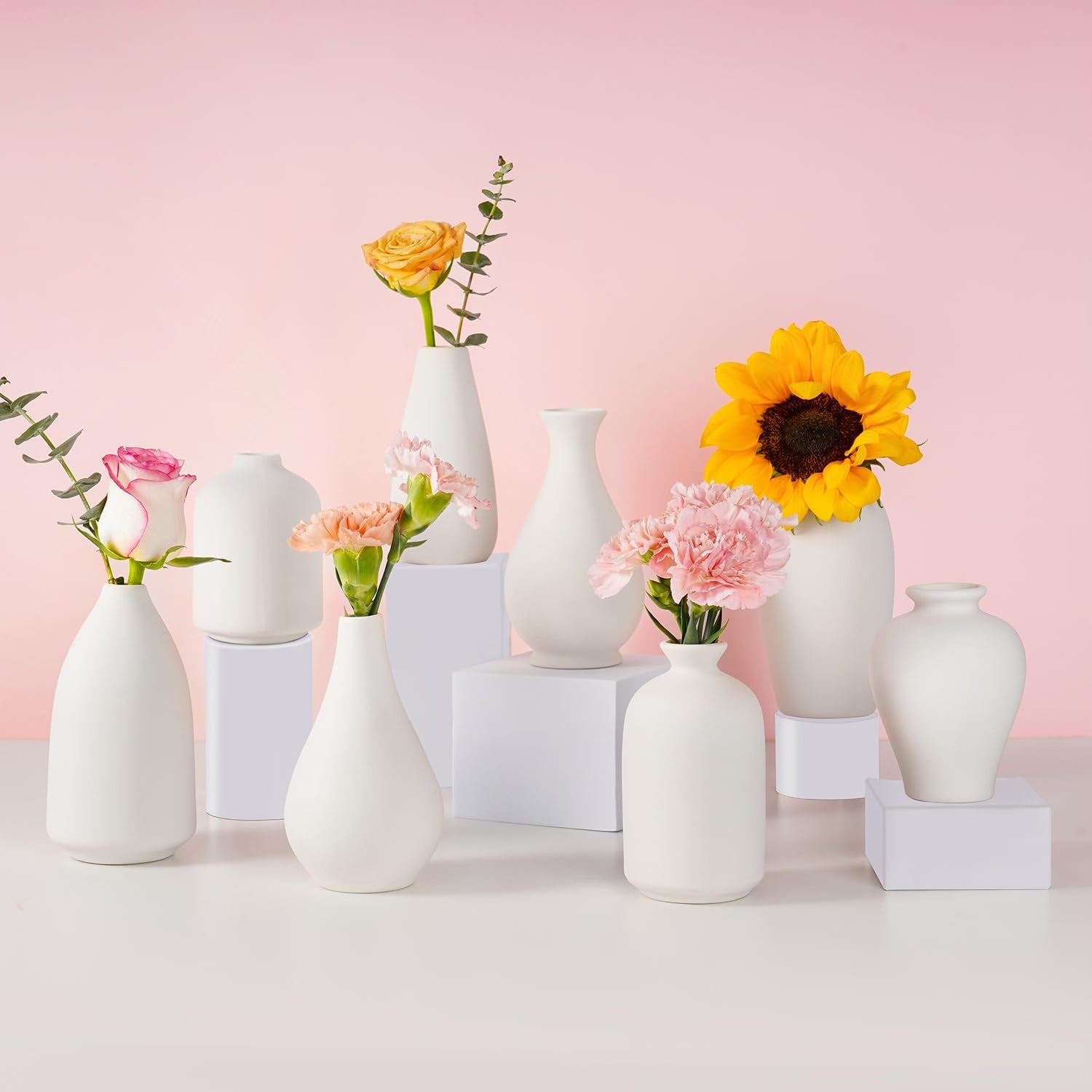 White ceramic bud vases